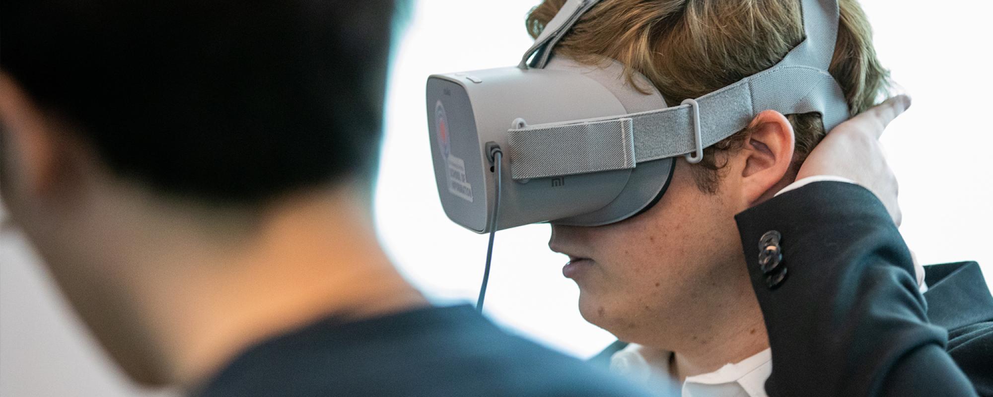 Student wearing virtual reality headset