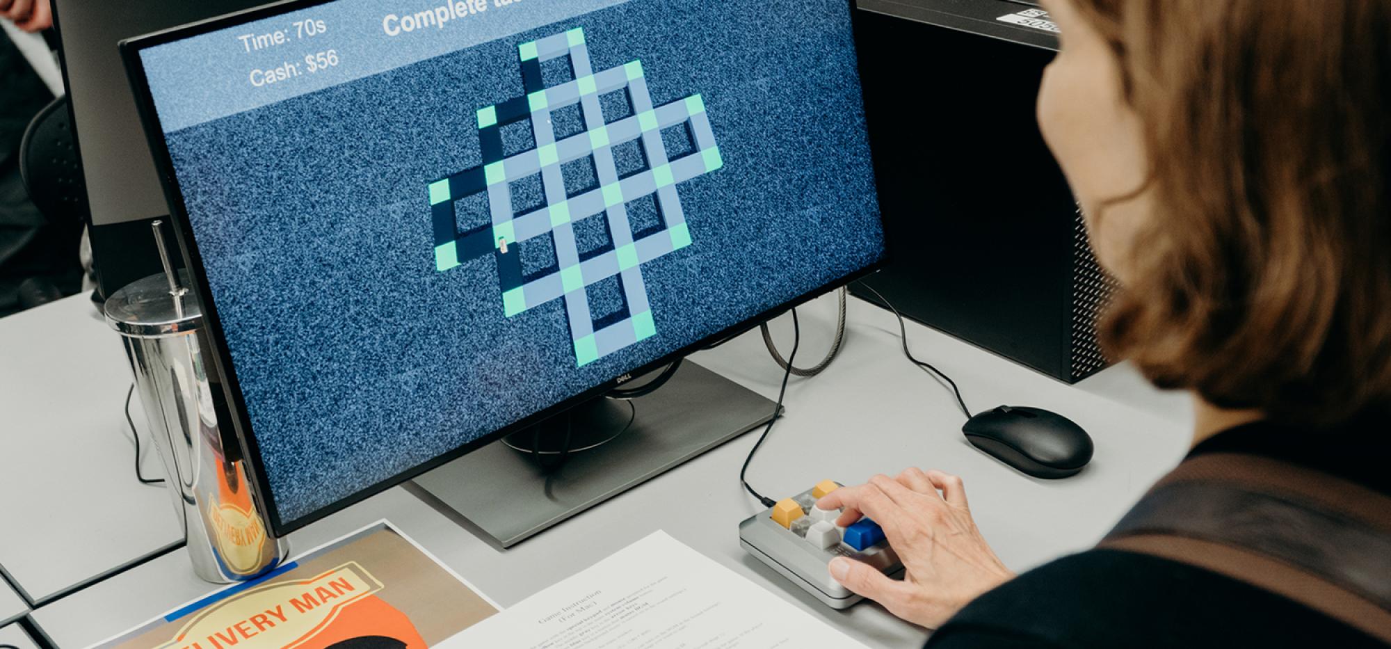 Woman testing a student created game